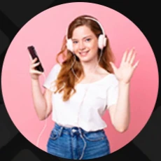 Woman waving while holding a phone